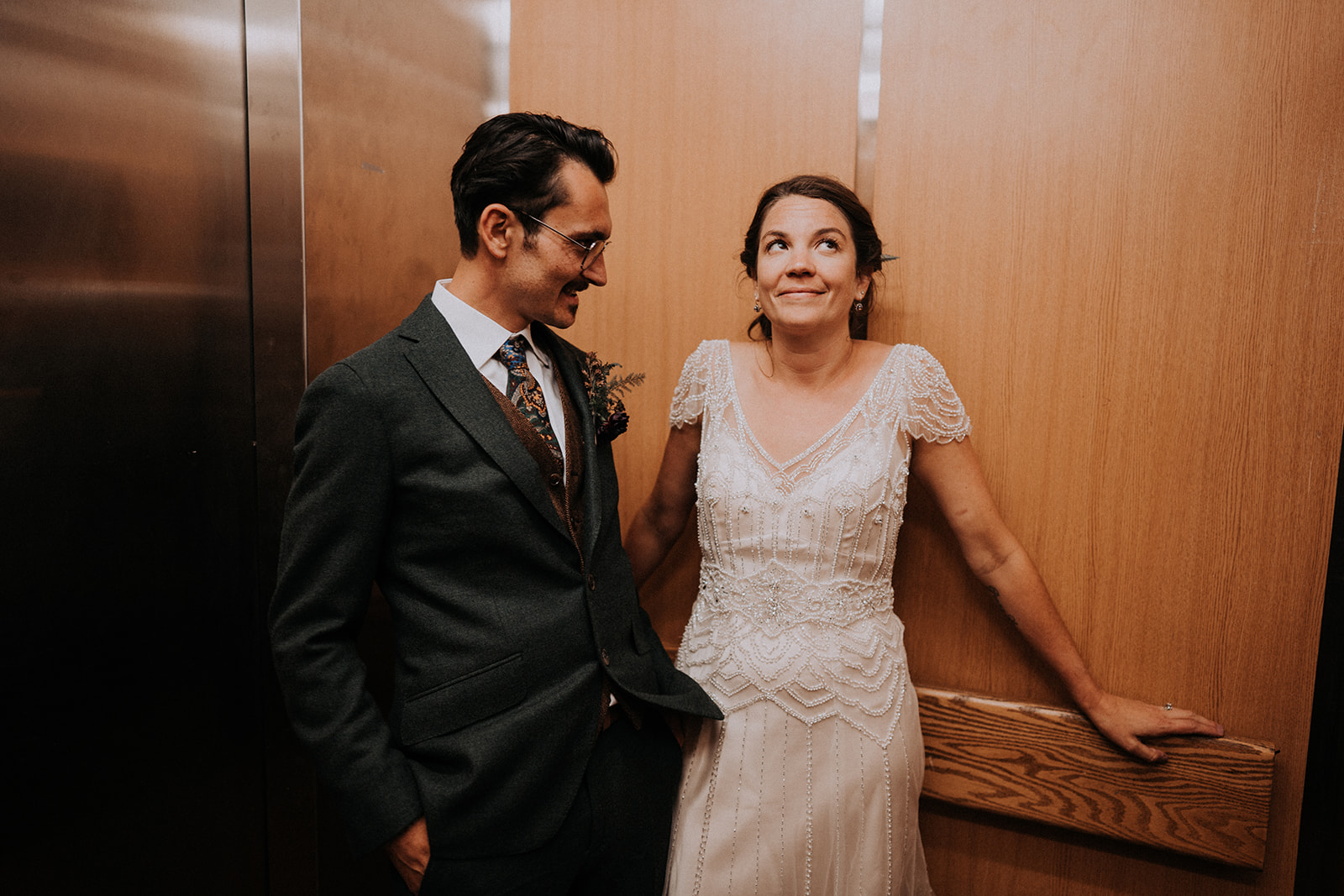 Bride & Groom in the elevator on wedding day