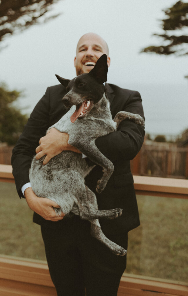 groom and his dog