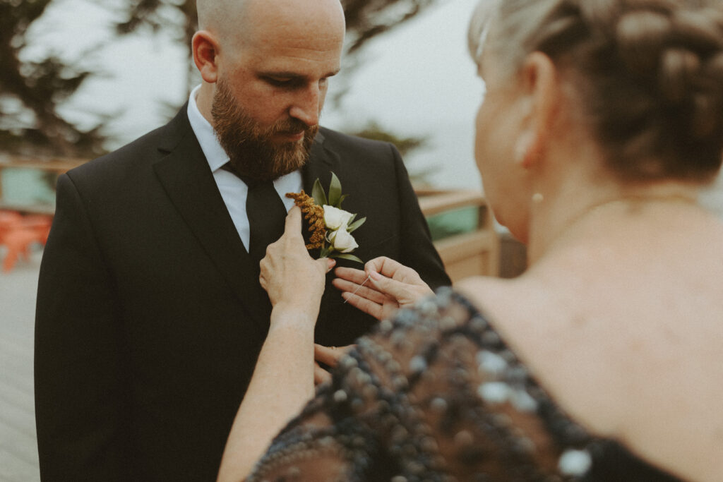 pinning the groom 