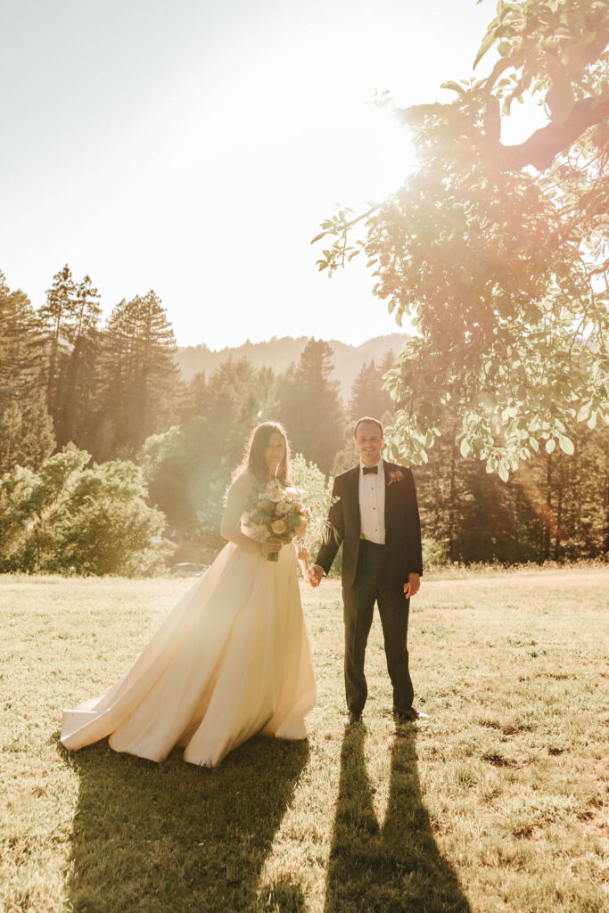 Bride at golden hour during a Vintage-Inspired Wedding, glowing in soft sunset light.
