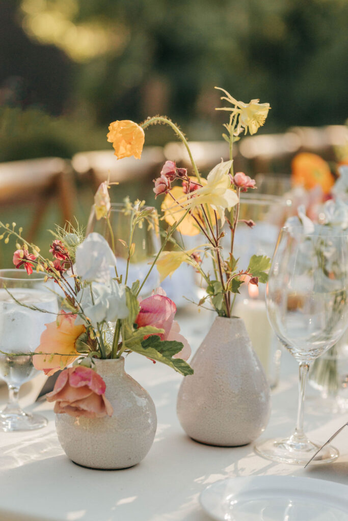Styled reception table featuring antique-inspired place settings at a Vintage-Inspired Wedding.