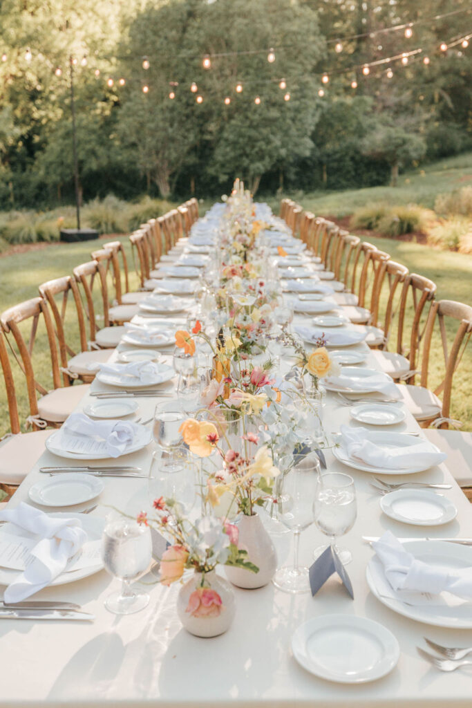 Vintage-Inspired Wedding table setting with elegant candles, layered textures, and classic details.