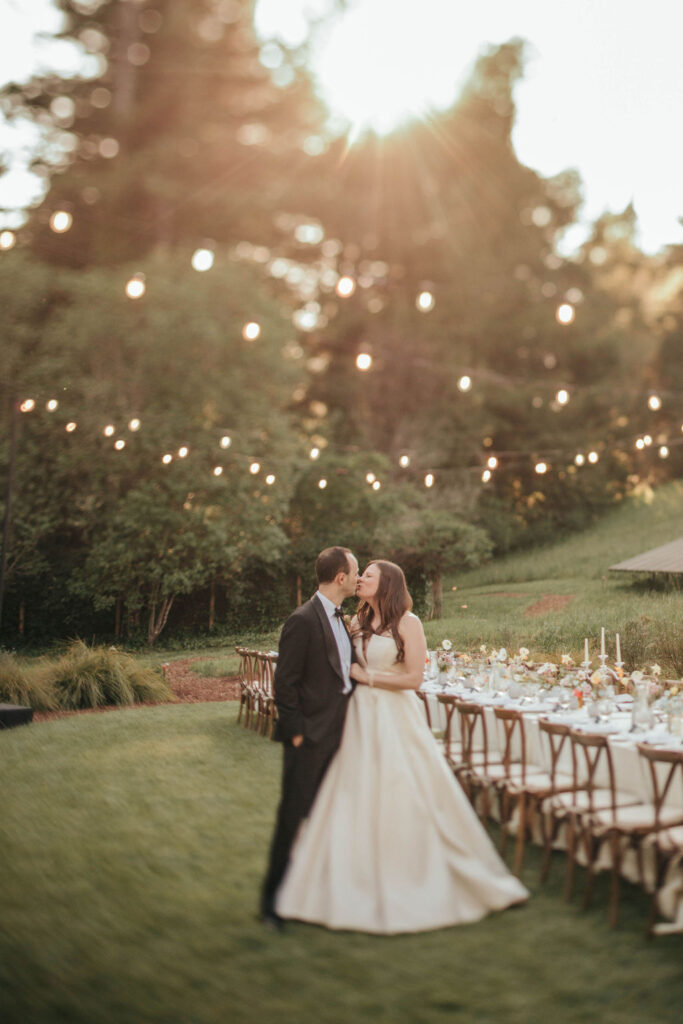vintage-inspired bridal look standing among the property’s redwoods